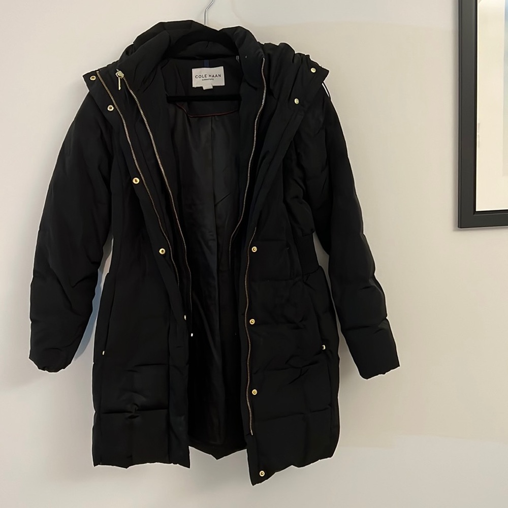 Super warm down jacket, hits above knee.  Gently worn condition.